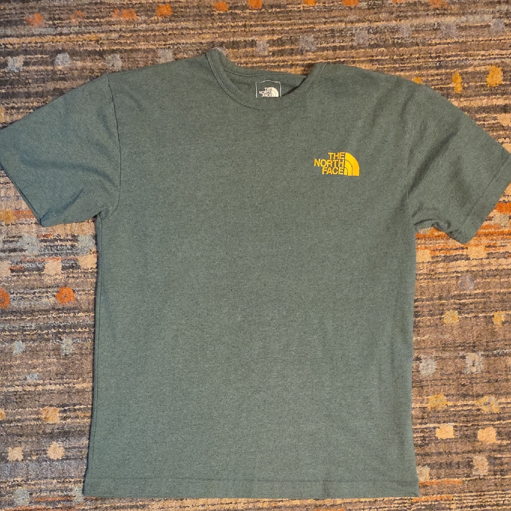 The North Face Heather Green graphic tee.